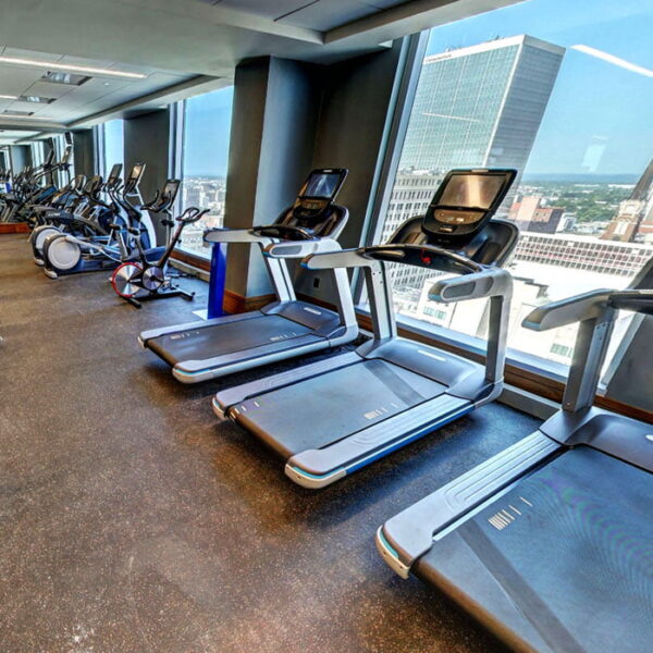 Louisville KY Apartments - Spacious Fitness Room Featuring Various Gym Equipment