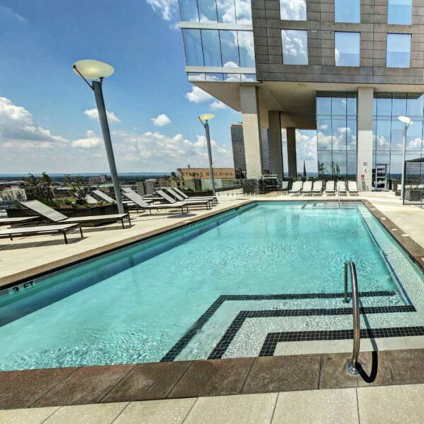 Apartments for Rent in Louisville KY - Rooftop Swimming Pool Featuring Various Lounging Areas